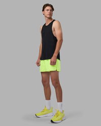 Man wearing Pace 3" Performance Short - Lime Glo | Model:Brandon | Size:L