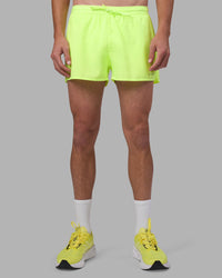 Man wearing Pace 3" Performance Short - Lime Glo | Model:Brandon | Size:L