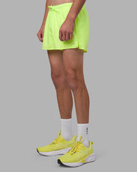 Man wearing Pace 3" Performance Short - Lime Glo | Model:Brandon | Size:L