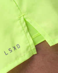 Man wearing Pace 3" Performance Short - Lime Glo | Model:Brandon | Size:L