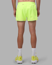 Man wearing Pace 3" Performance Short - Lime Glo | Model:Brandon | Size:L