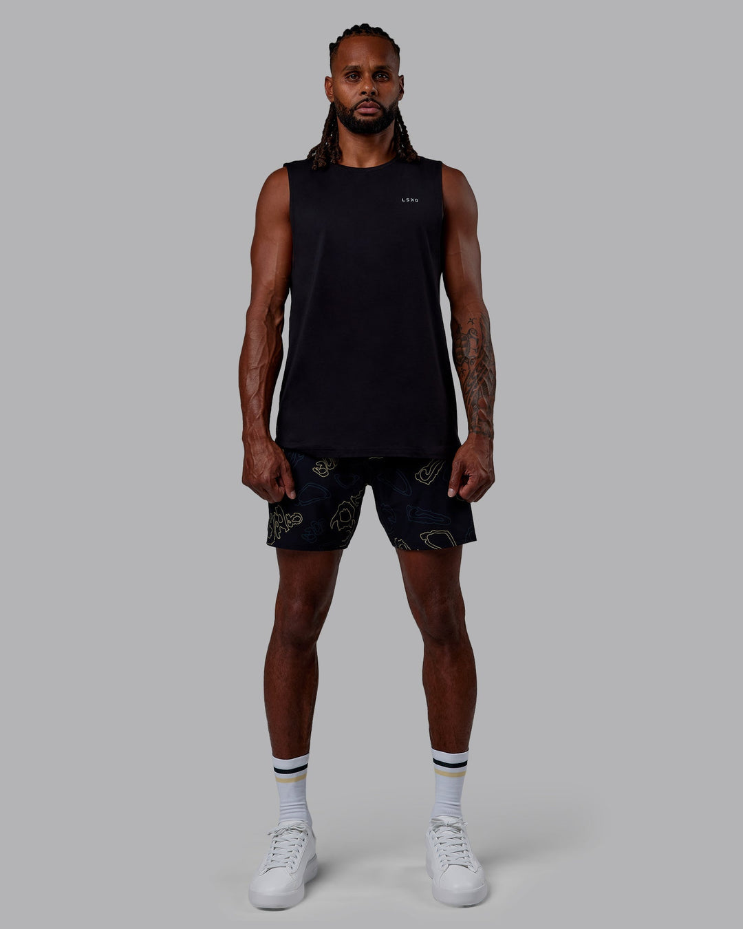 Man wearing Patty Mills Perform VapourFLX Muscle Tank - Black Reflective