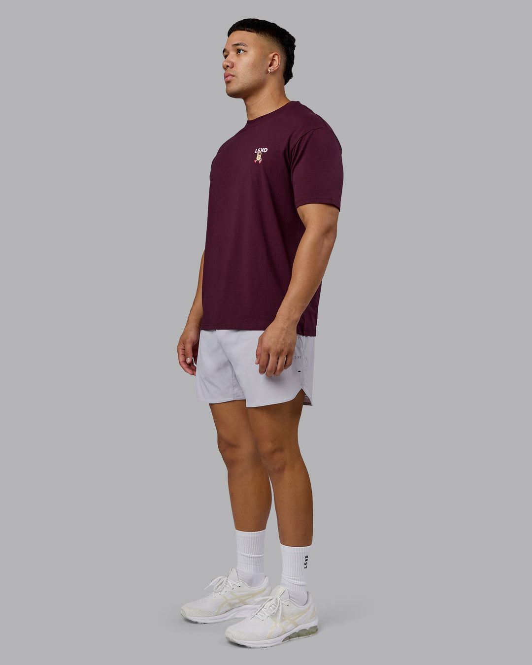Man wearing Perspective FLXCotton Oversized Tee - Cherry Lacquer-Soft Pink | Model:Kaelyb | Size:L