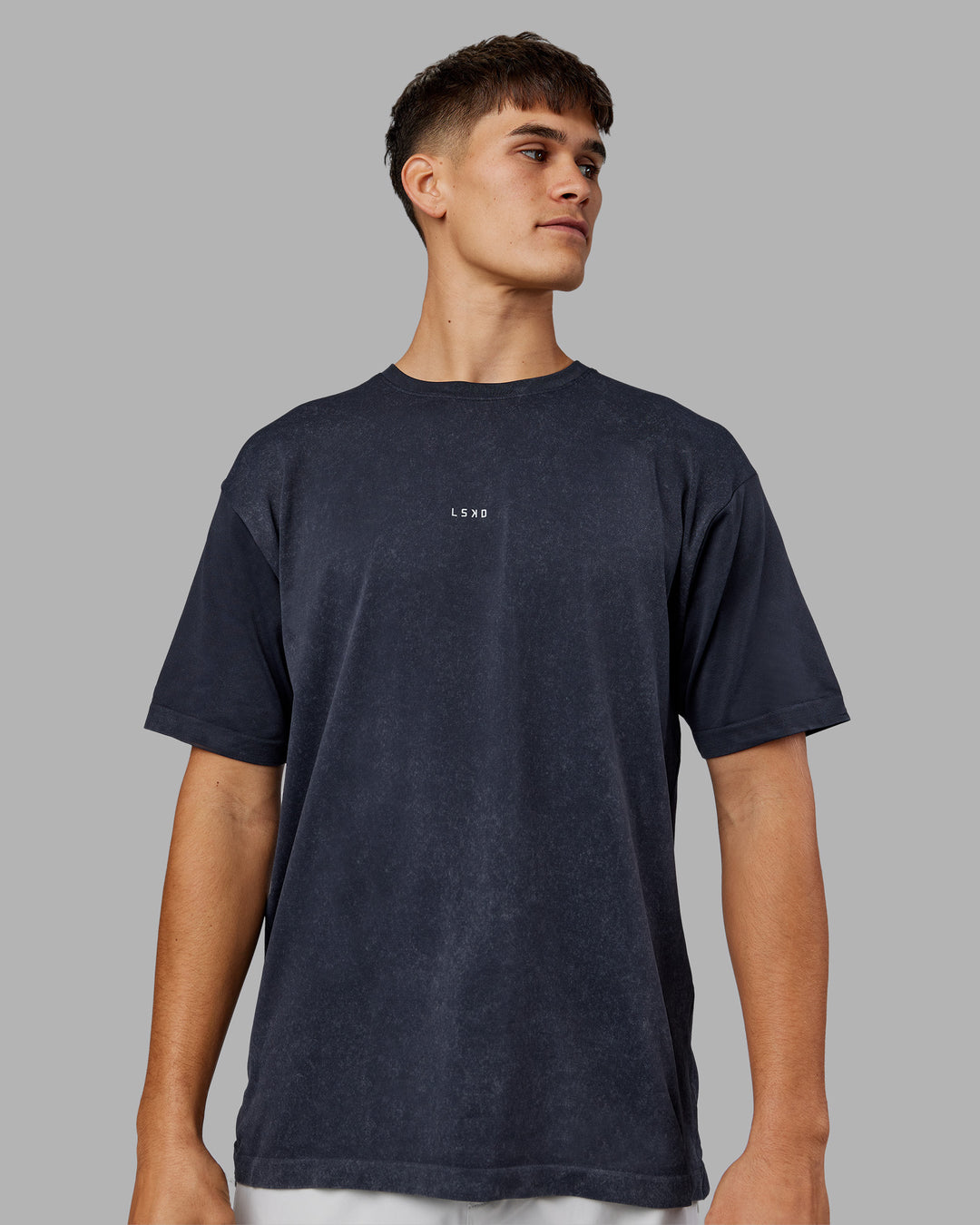 Man wearing Power Oversized Tee - Pirate Black Washed |Model:Jackson | Size:L
