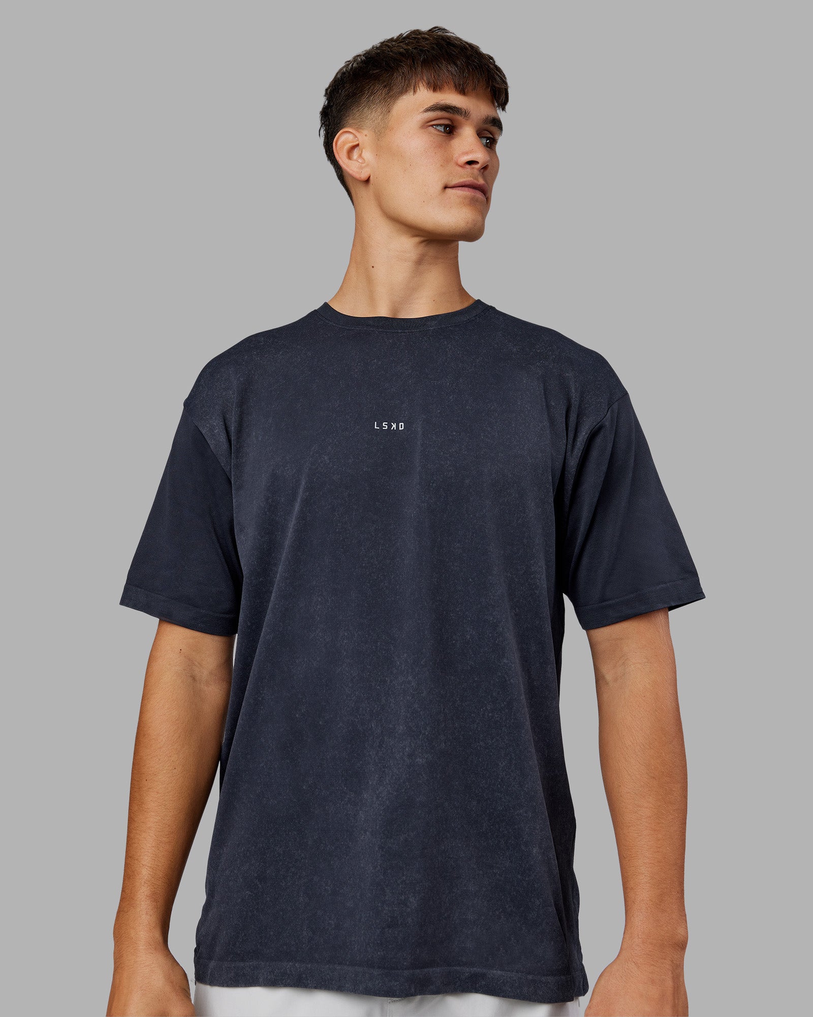 Man wearing Power Oversized Tee - Pirate Black Washed |Model:Jackson | Size:L