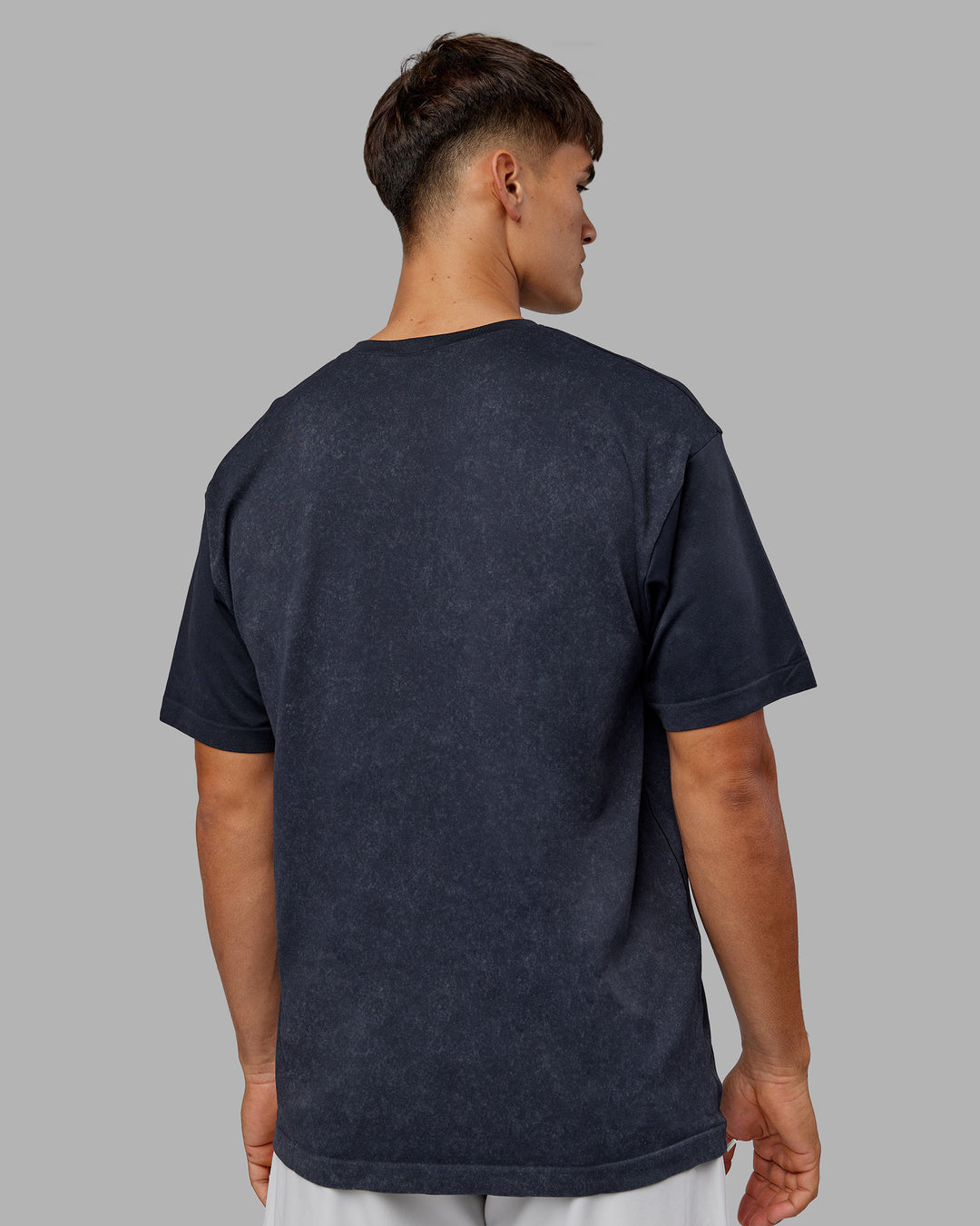 Man wearing Power Oversized Tee - Pirate Black Washed |Model:Jackson | Size:L