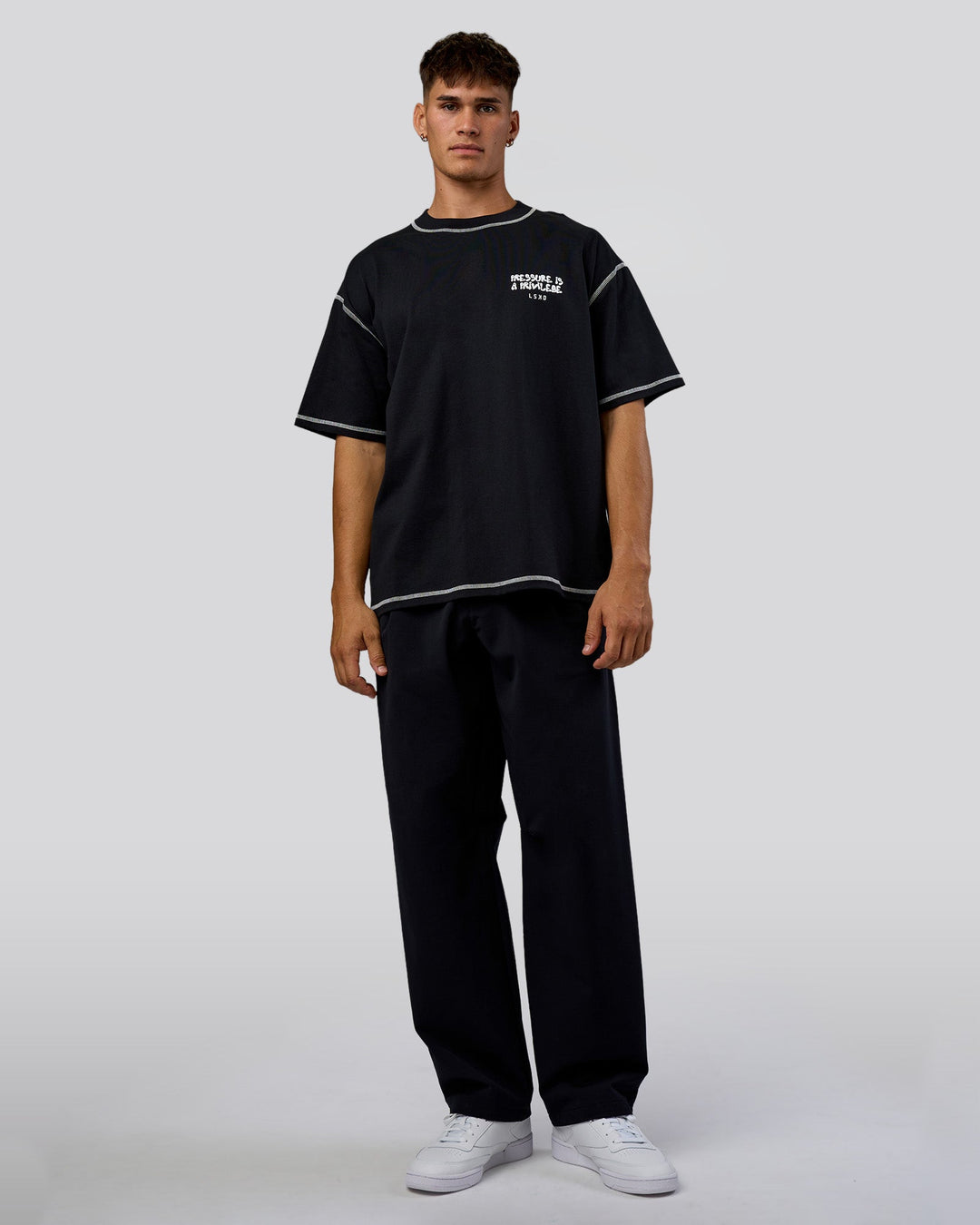 Man wearing Pressure is Privilege Oversized Tee - Black-White | Model:Jackson | Size:L