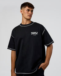 Man wearing Pressure is Privilege Oversized Tee - Black-White | Model:Jackson | Size:L