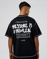Man wearing Pressure is Privilege Oversized Tee - Black-White | Model:Jackson | Size:L