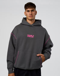 Man wearing Pressure is Privilege Oversized Hoodie - Dark Storm-Ultra Fuchsia | Model:Jackson | Size:L