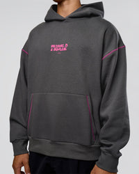 Man wearing Pressure is Privilege Oversized Hoodie - Dark Storm-Ultra Fuchsia | Model:Jackson | Size:L