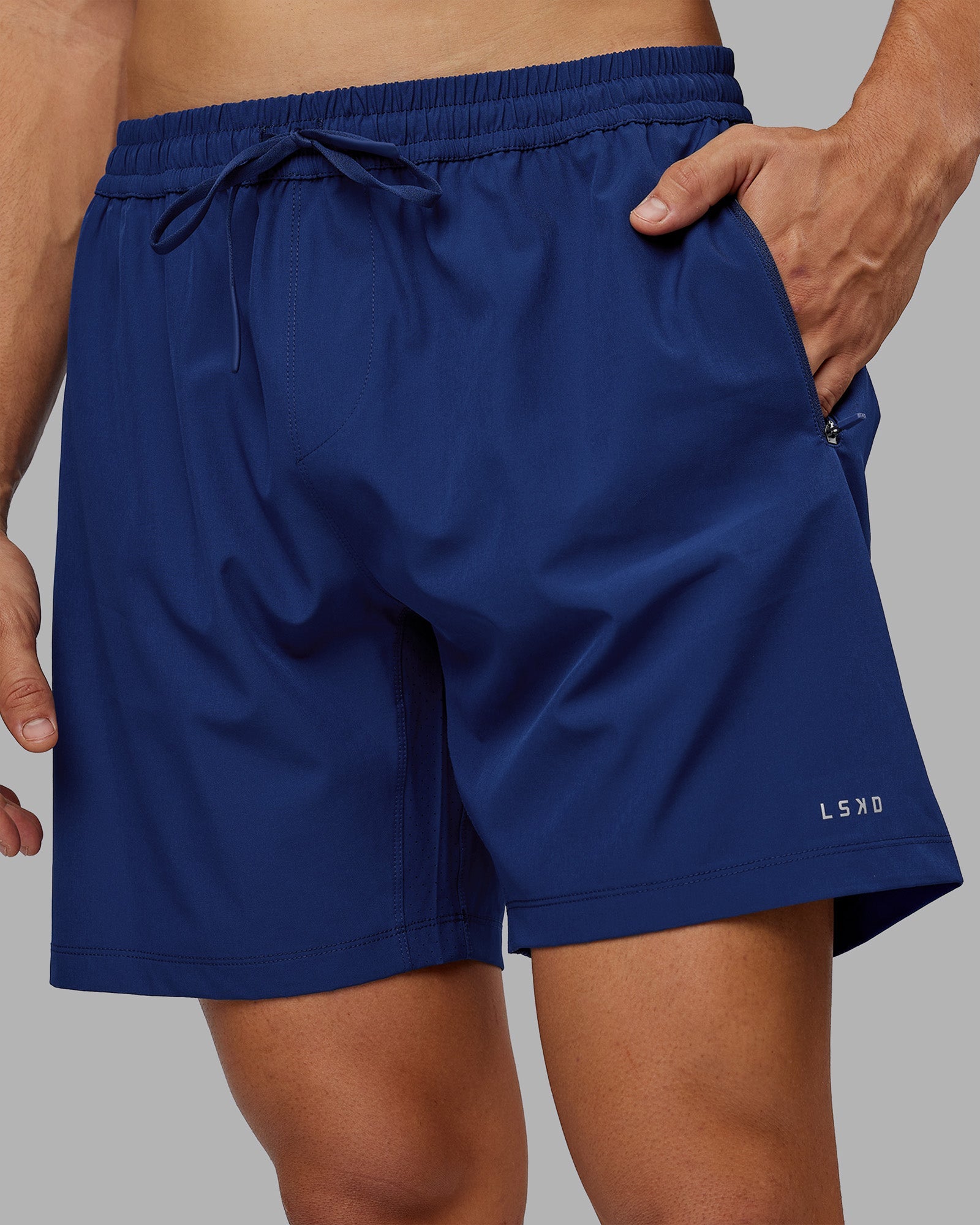 Man wearing Rep 7'' Performance Short - Midnight Blue | Model:Jackson | Size:L