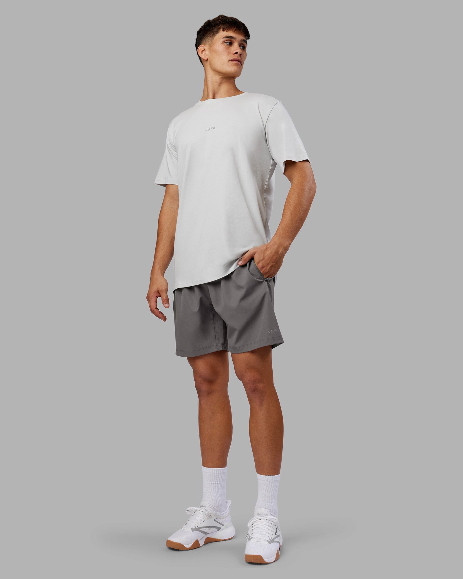 Man wearing Rep 7'' Performance Short - Storm Front | Model:Jackson | Size:L