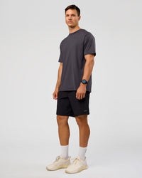 Man wearing Rep 9'' Training Short - Black | Model:Liam | Size:L