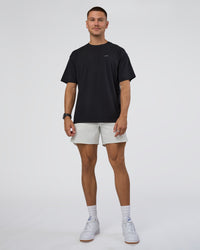 Man wearing Research Department FLXCotton Oversized Tee - Black | Model:Nikola | Size:L