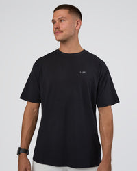 Man wearing Research Department FLXCotton Oversized Tee - Black | Model:Nikola | Size:L