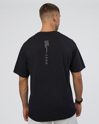 Man wearing Research Department FLXCotton Oversized Tee - Black | Model:Nikola | Size:L