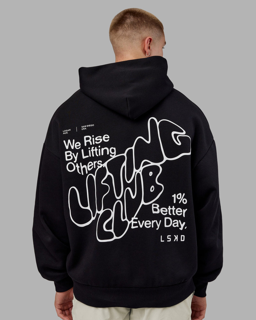 Man wearing Rise &amp; Lift Hoodie Oversized - Black-White | Model:Tom | Size:L