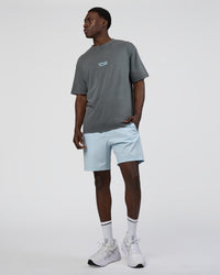 Man wearing Runner's FLXCotton Oversized Tee - Dark Storm Washed-Open Air | Model:Paabio | Size:L