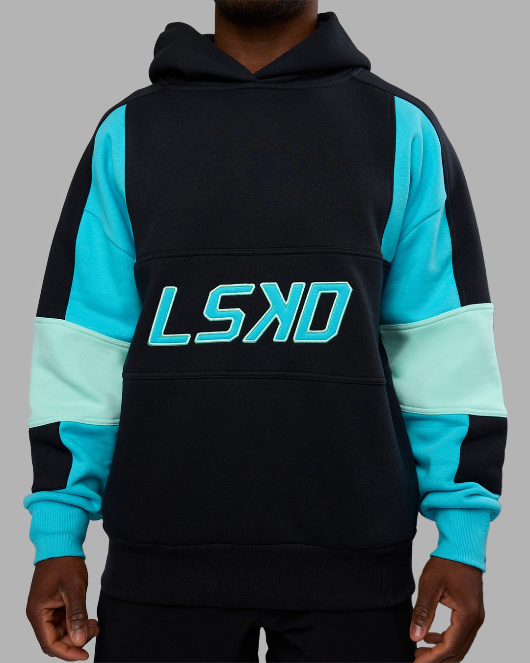 Man wearing Slam Oversized Hoodie - Caviar-Blue Atoll | Model:Sam | Size:L