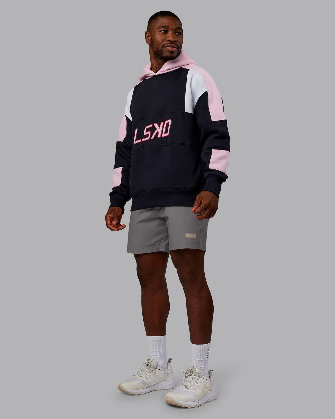 Man wearing Slam Oversized Hoodie - Caviar-Light Bubblegum | Model:Sam | Size:L