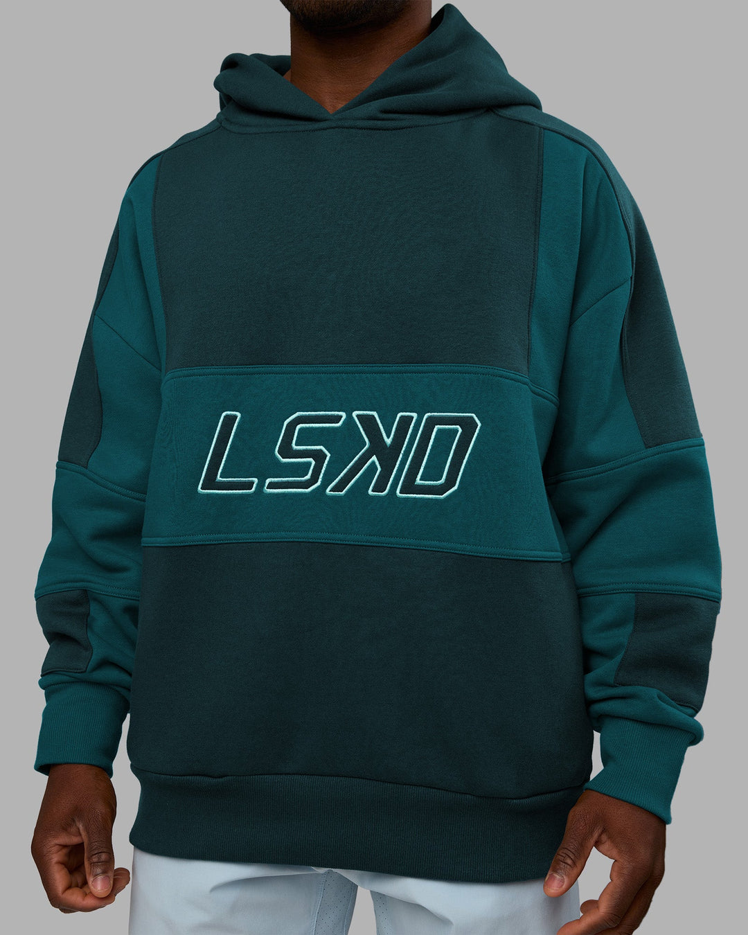 Man wearing Slam Oversized Hoodie - Deep Sea-Blue Coral | Model:Sam | Size:L