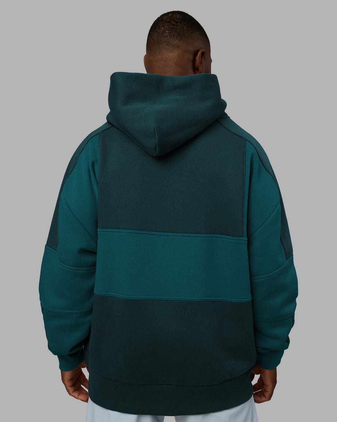 Man wearing Slam Oversized Hoodie - Deep Sea-Blue Coral | Model:Sam | Size:L