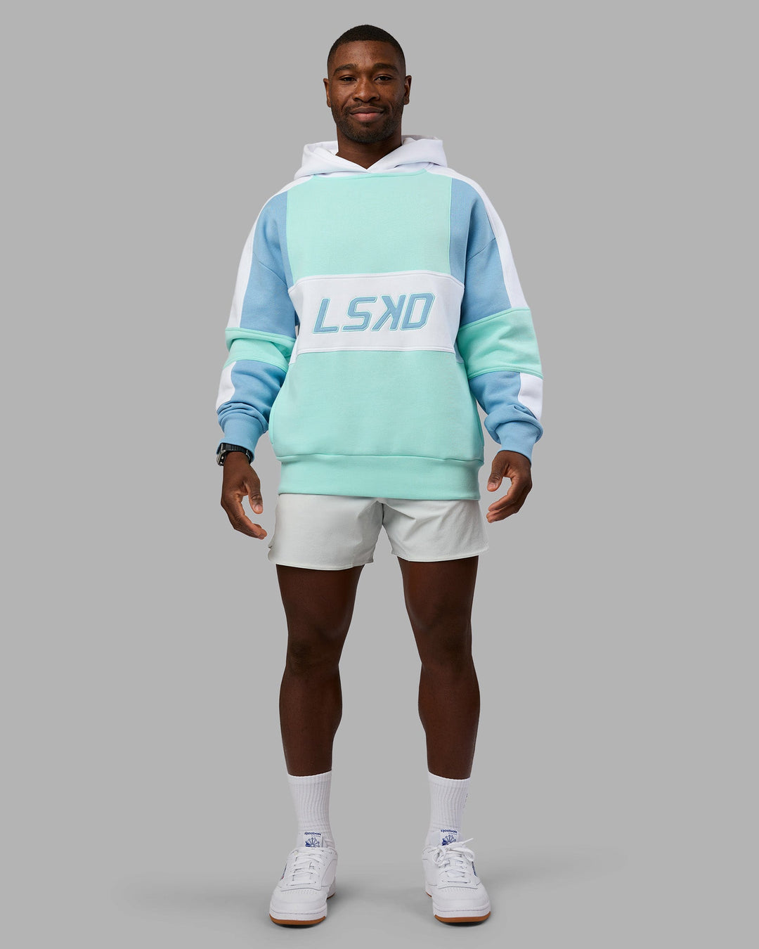 Man wearing Slam Oversized Hoodie - Glacier Lake-Water Spout | Model:Sam | Size:L