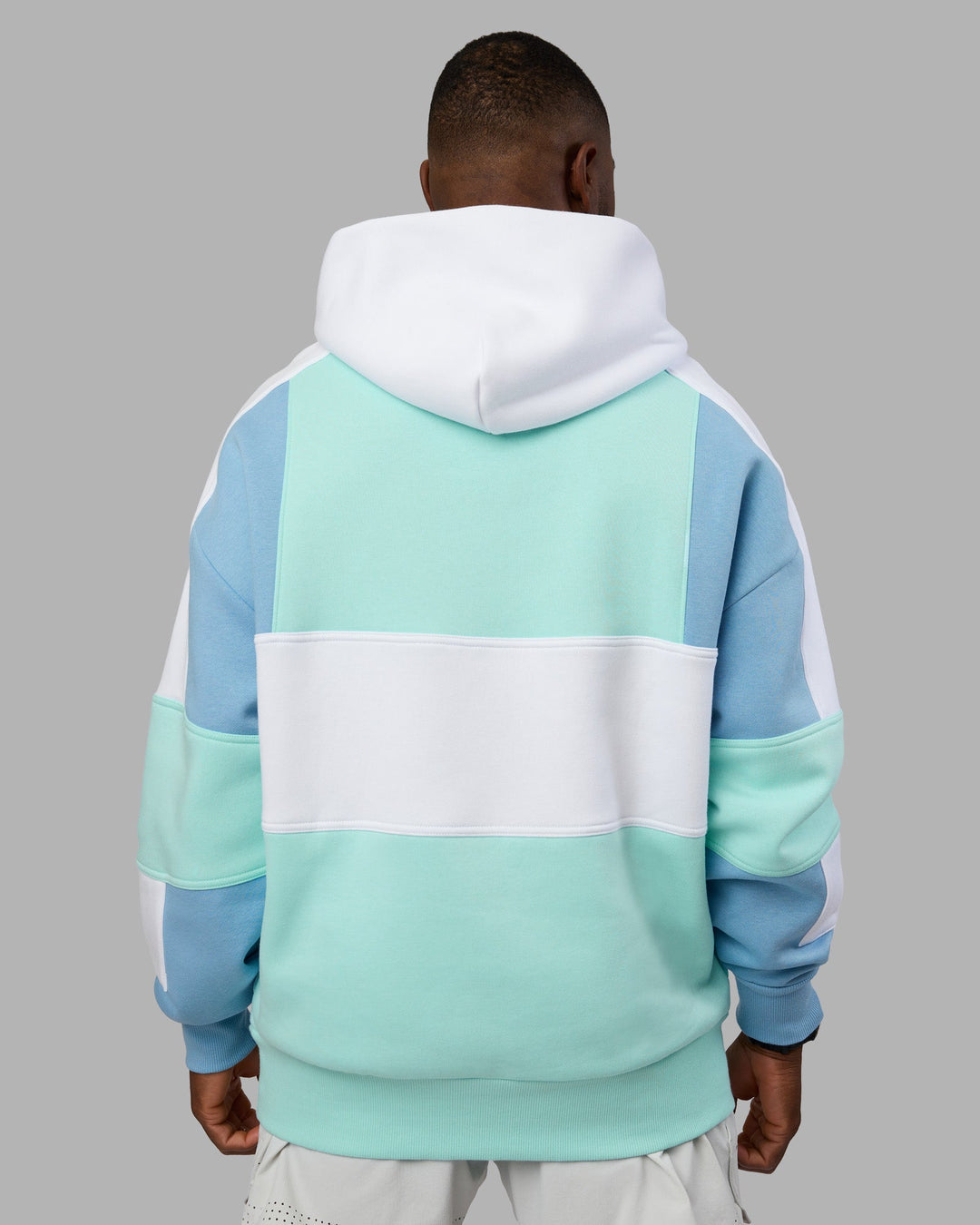 Man wearing Slam Oversized Hoodie - Glacier Lake-Water Spout | Model:Sam | Size:L