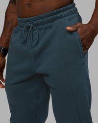 Man wearing Stream Panel Track Pants - Deep Sea | Model:Sam | Size:L