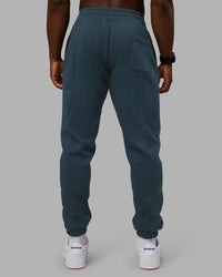 Man wearing Stream Panel Track Pants - Deep Sea | Model:Sam | Size:L