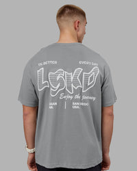 Man wearing Time's Up Heavyweight Oversized Tee - Circular Grey-White | Model:Tom | Size:L