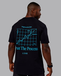 Man wearing Trust The Process 2.0 FLXCotton Tee Oversize - Black-Blue Atoll | Model:Sam | Size:L