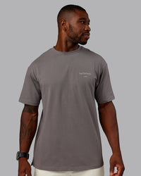 Man wearing Trust The Process 2.0 FLXCotton Tee Oversize - Storm Front-Shale Beige | Model:Sam | Size:L