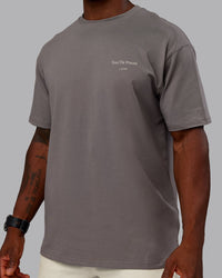 Man wearing Trust The Process 2.0 FLXCotton Tee Oversize - Storm Front-Shale Beige | Model:Sam | Size:L