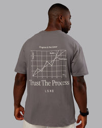 Man wearing Trust The Process 2.0 FLXCotton Tee Oversize - Storm Front-Shale Beige | Model:Sam | Size:L