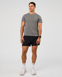 Man wearing UltraAir 5" Lined Performance Short  - Black-Reflective | Model:Liam | Size:L | Thumbnail Index: 5