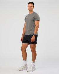 Man wearing UltraAir 5" Lined Performance Short  - Black-Reflective | Model:Liam | Size:L | Thumbnail Index: 8