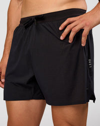 Man wearing UltraAir 5" Lined Performance Short  - Black-Reflective | Model:Liam | Size:L | Thumbnail Index: 0