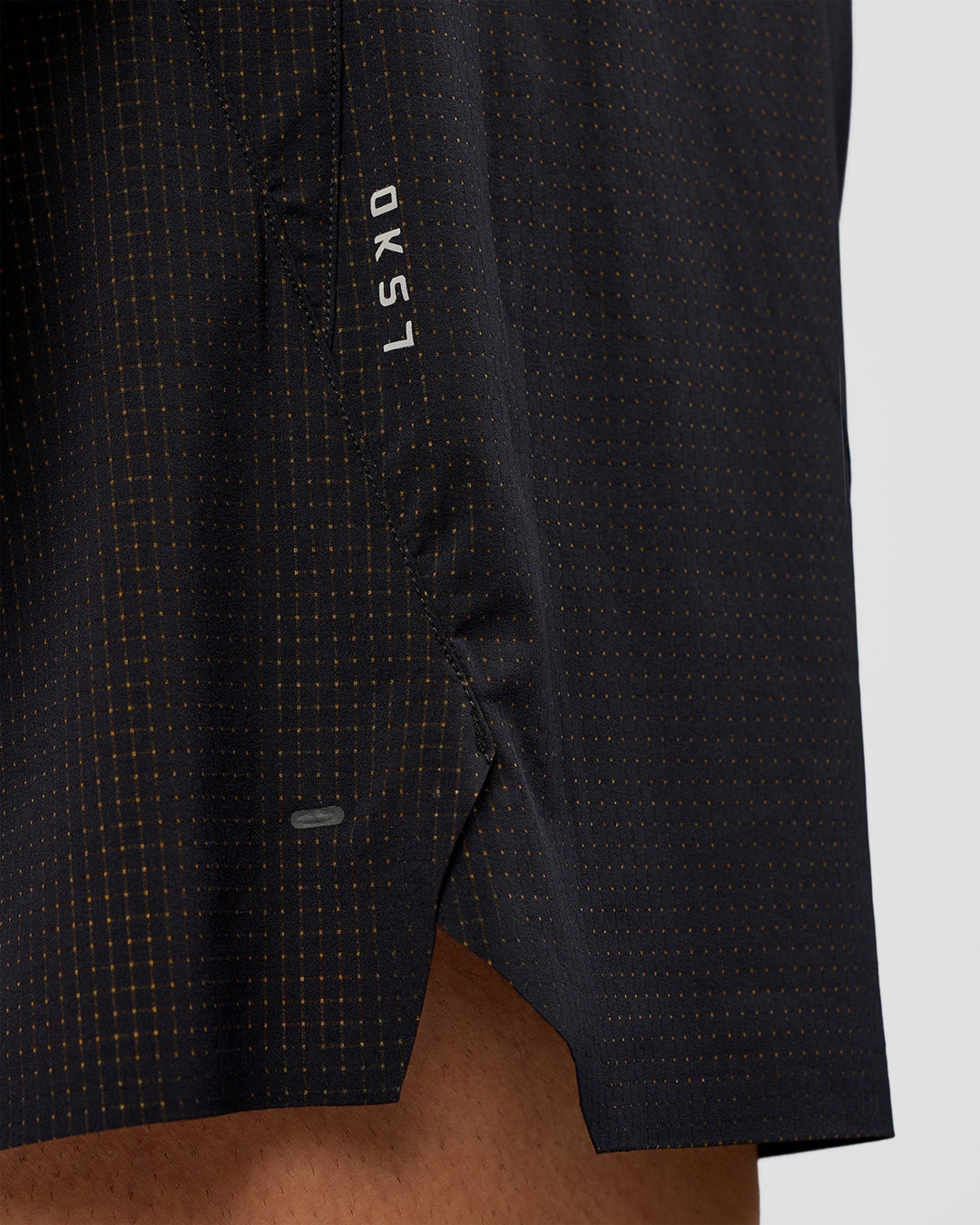 Man wearing UltraAir 5" Lined Performance Short  - Black-Reflective | Model:Liam | Size:L - view 10