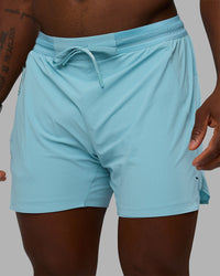 Man wearing UltraAir 5" Lined Performance Short - Retro Blue | Model:Sam | Size:L