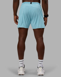 Man wearing UltraAir 5" Lined Performance Short - Retro Blue | Model:Sam | Size:L