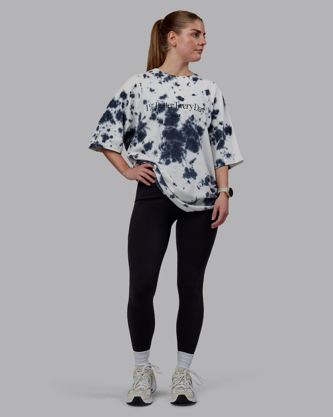 Woman wearing Unisex 1% Better Heavyweight Oversize Tee - White-Black Tie Dye