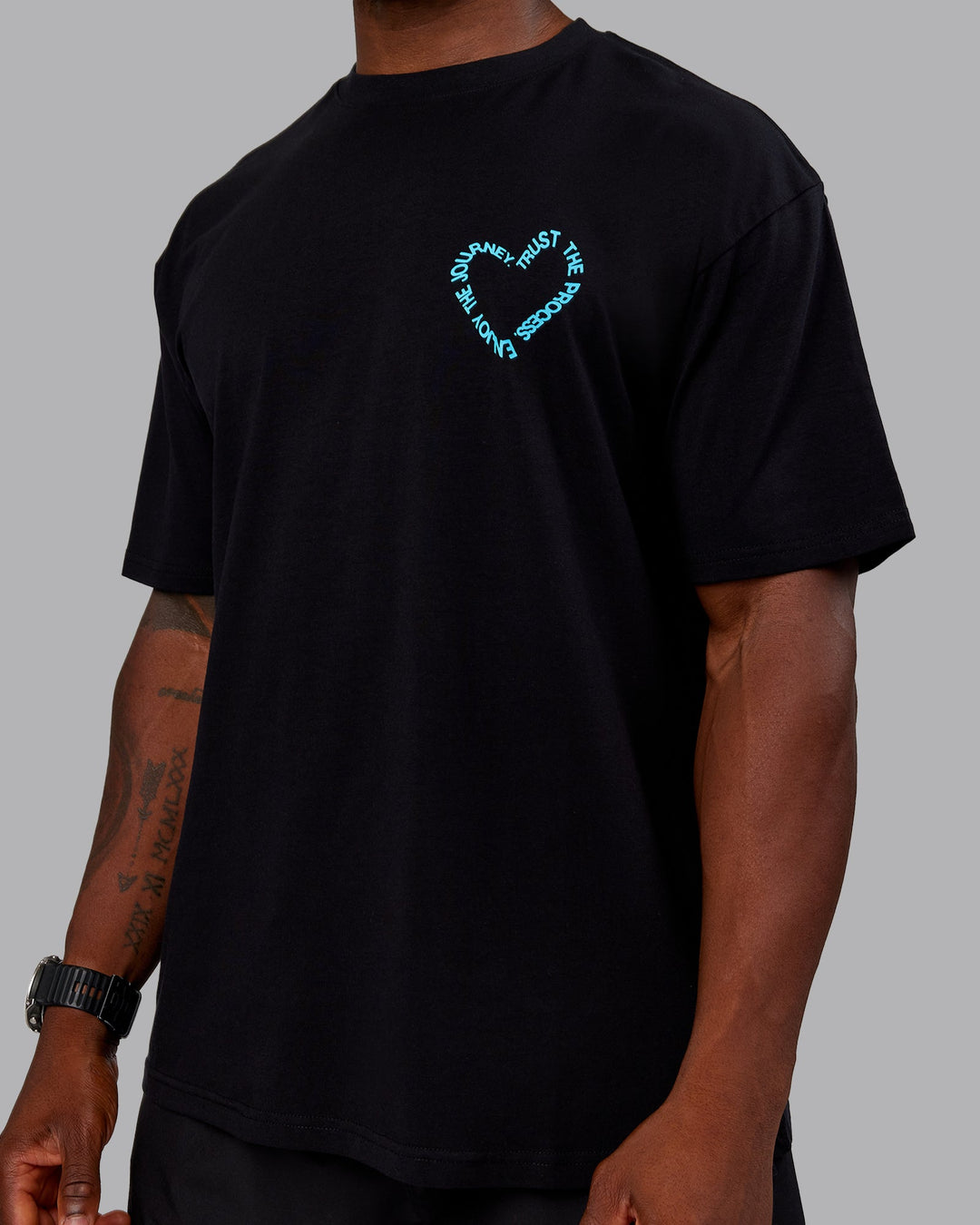 Man wearing Love The Process FLXCotton Oversize Tee - Black-Blue Atoll | Model:Sam | Size:L