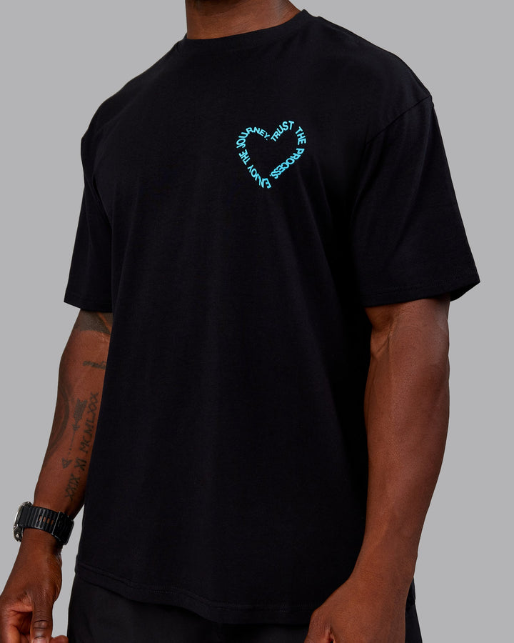 Man wearing Love The Process FLXCotton Oversize Tee - Black-Blue Atoll | Model:Sam | Size:L
