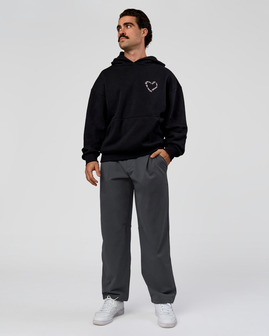 Man wearing Unisex Love The Process Oversize Hoodie - Black-Marshmallow | Model:Adam | Size:L