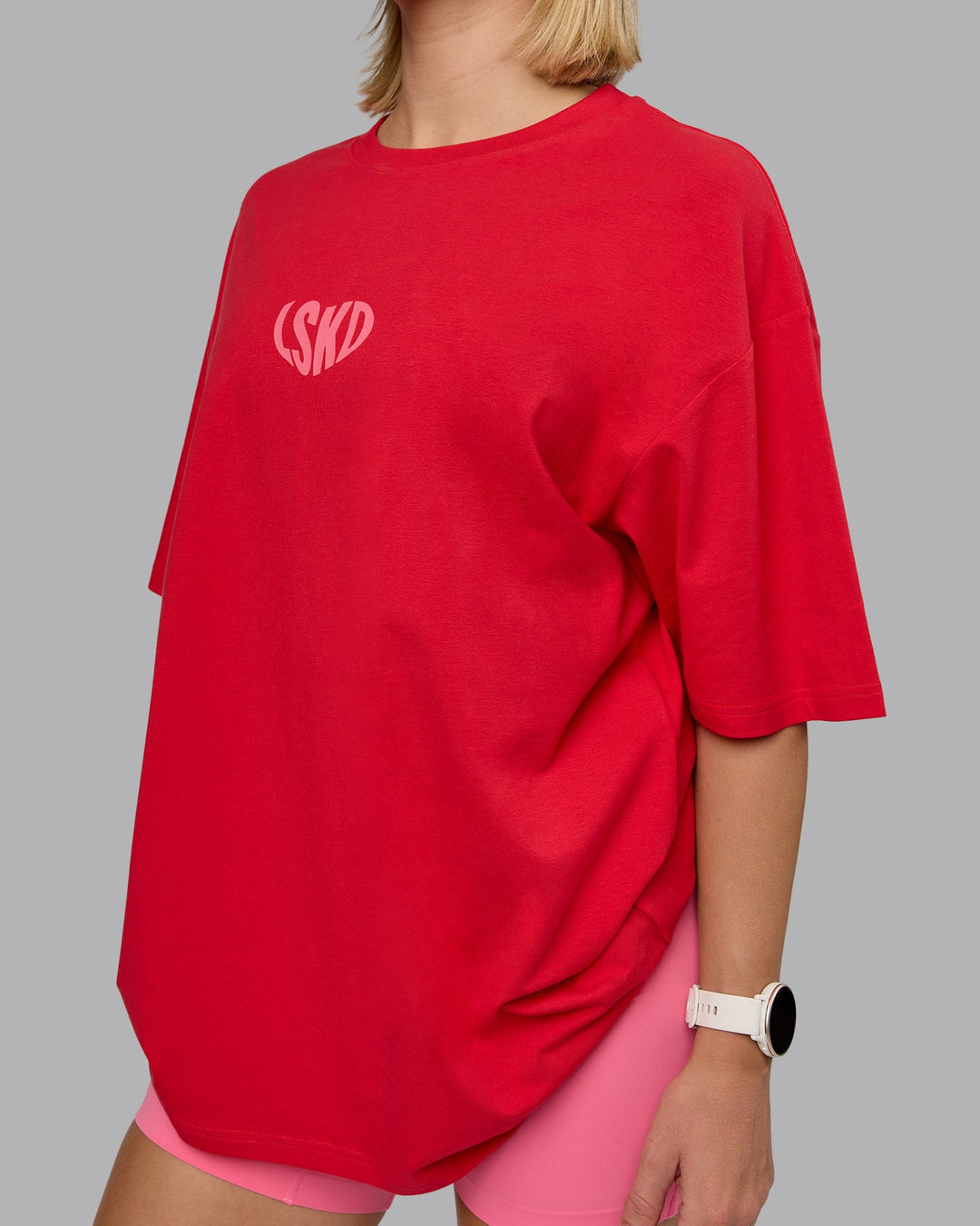 Woman wearing Unisex Love To Train FLXCotton Tee Oversize in Scarlet-Pink Lemonade | Size:L