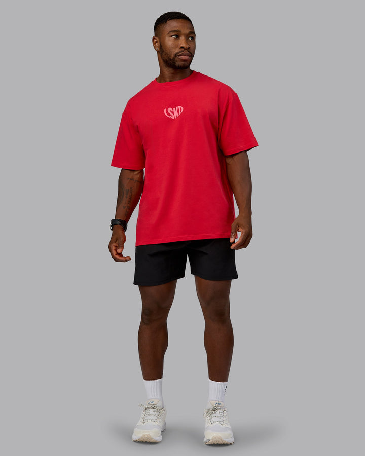 Man wearing Unisex Love To Train FLXCotton Tee Oversize in Scarlet-Pink Lemonade | Size:L
