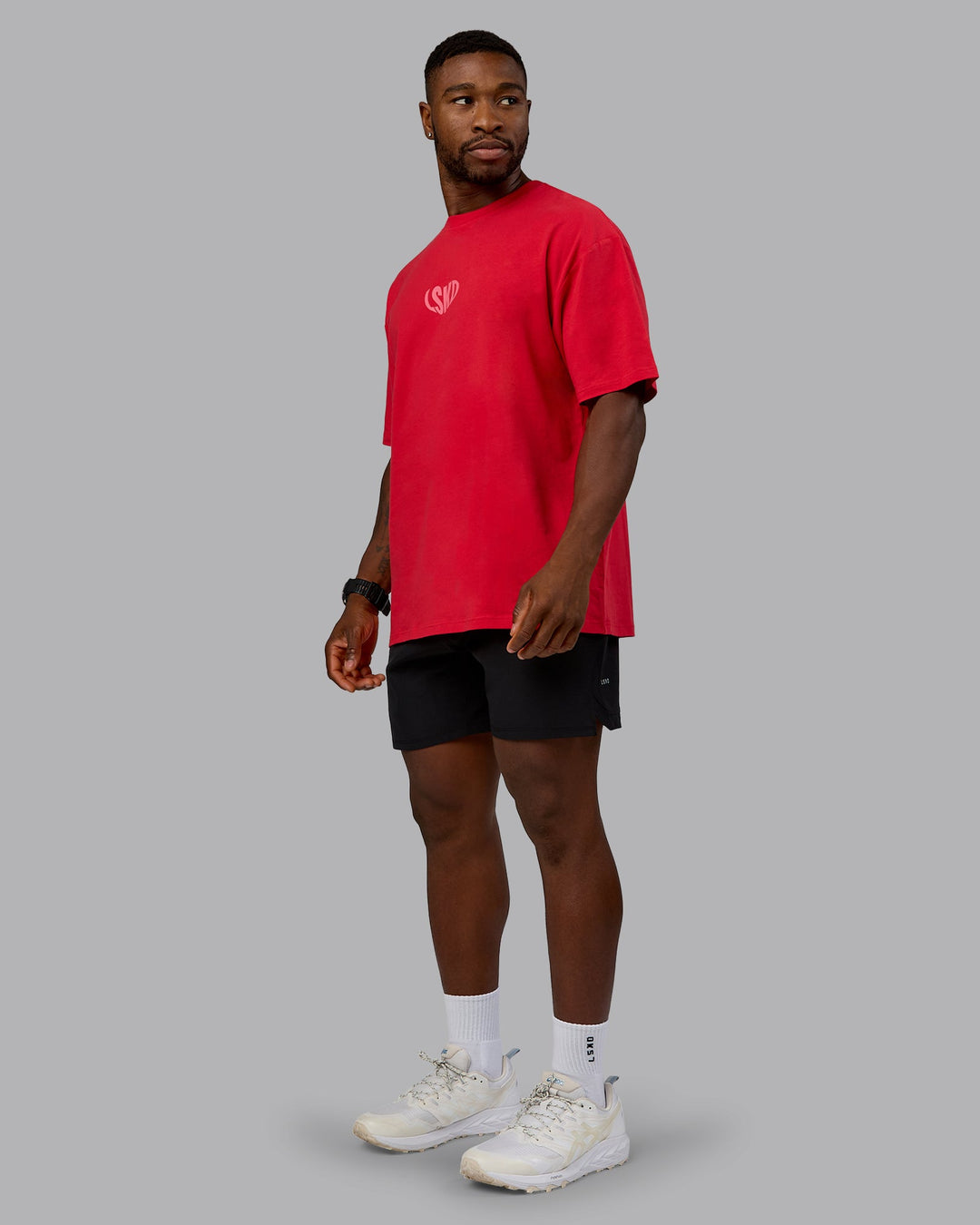 Man wearing Unisex Love To Train FLXCotton Tee Oversize in Scarlet-Pink Lemonade | Size:L