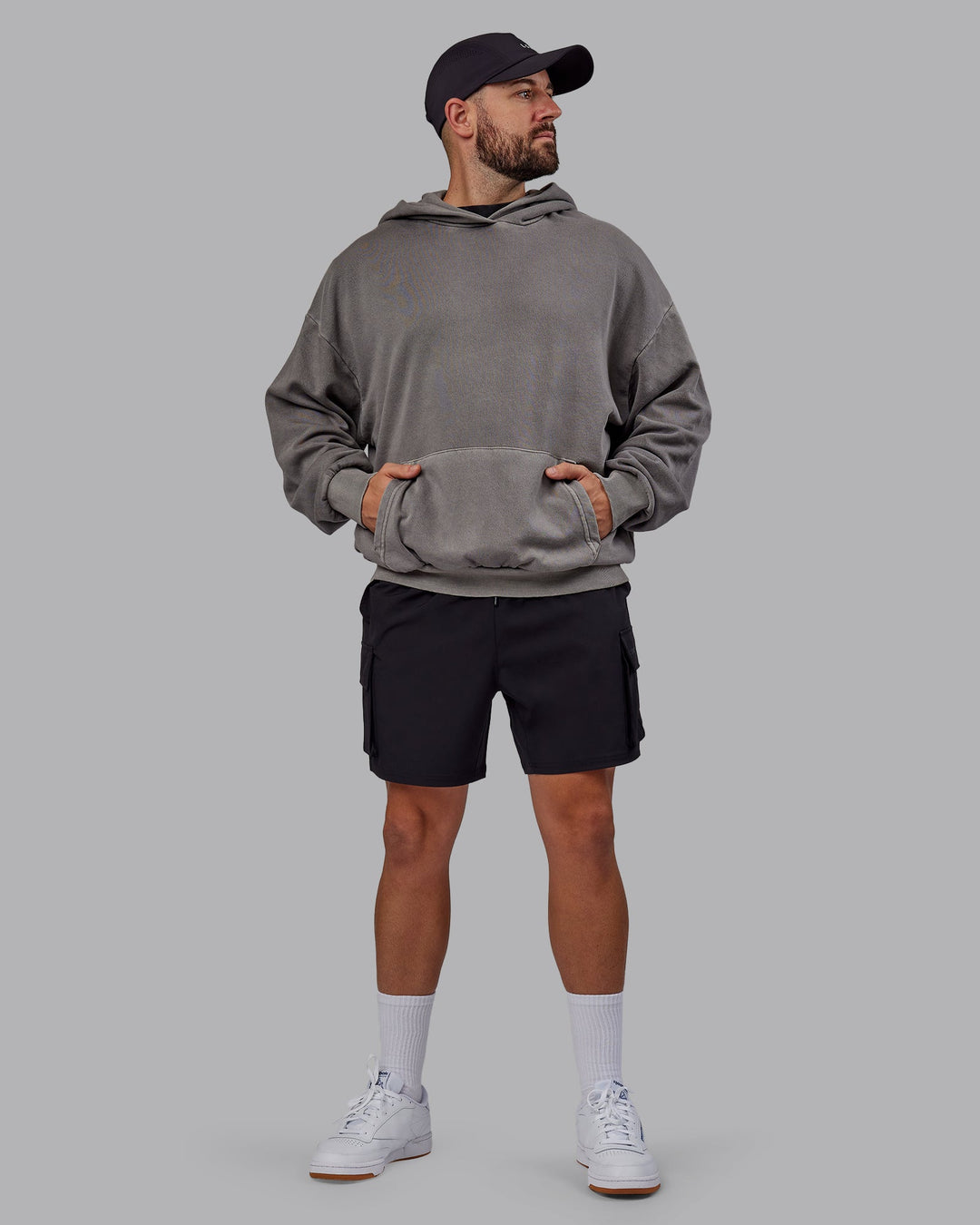 Man wearing Unisex Miami25 Washed Hoodie Oversize - Storm Front